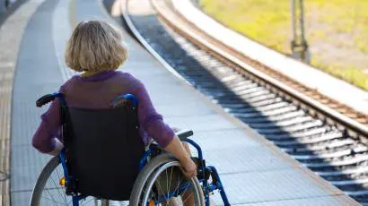 woman sitting on wheelchair on a platform 1