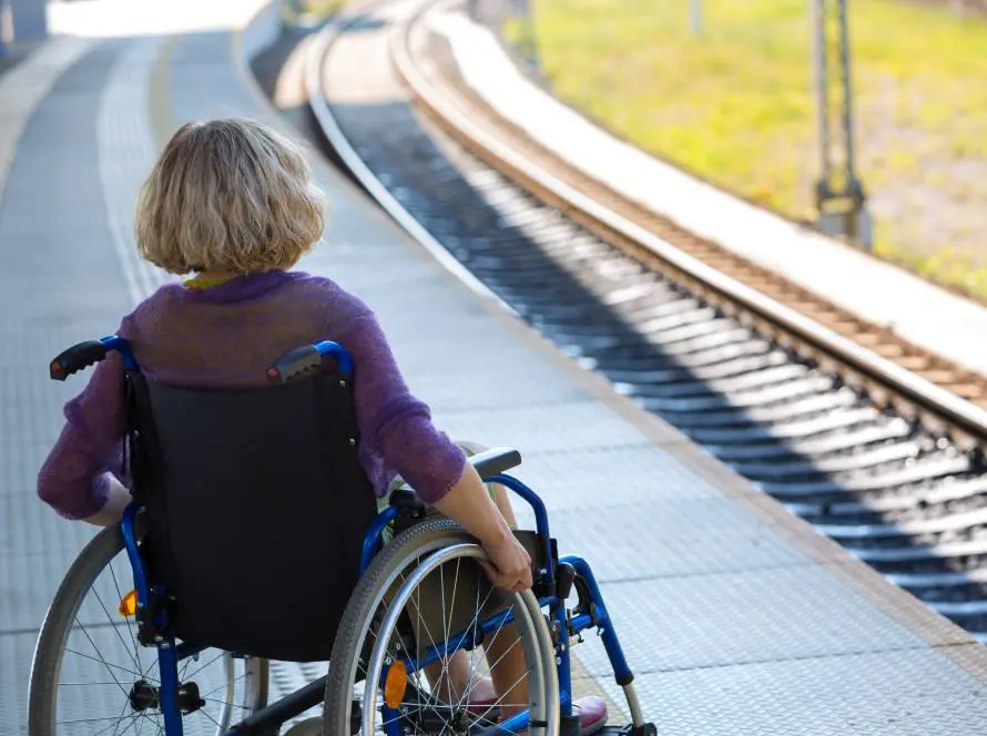 woman sitting on wheelchair on a platform 1