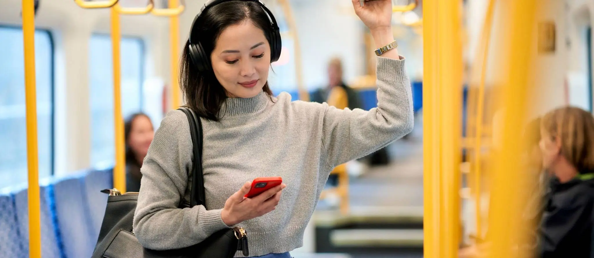 woman standing on train header scaled